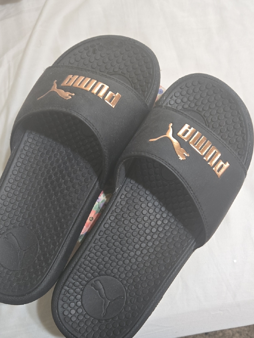 Puma Black Slides with Rose Gold Logo Accents